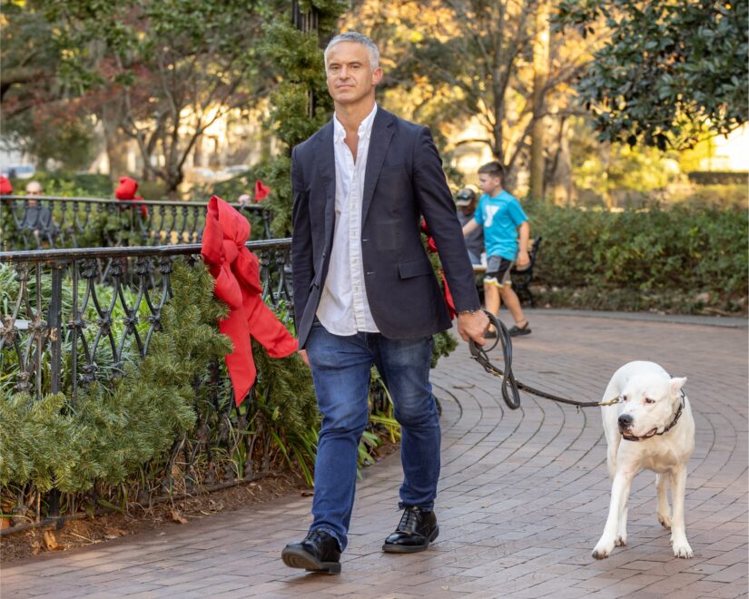 Jason Cerbone, Savannah DUI Lawyer & Credit Report Errors Attorney walking one of his Dogo Argentino's around Forsythe Park, Savannah, Georgia - Cerbone Law Jason Cerbone, Savannah DUI Lawyer & Credit Report Errors Attorney walking one of his Dogo Argentino's around Forsythe Park, Savannah, Georgia